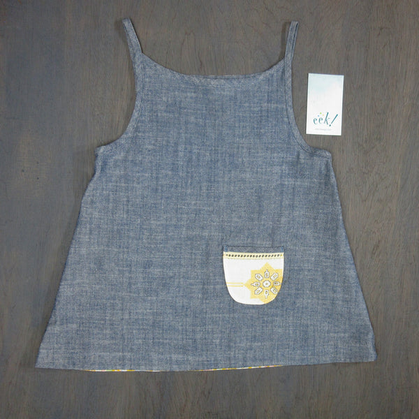 Child's reclaimed blue chambray cotton and cream and yellow vintage embroidery tank, with small embroidered pocket, size 8
