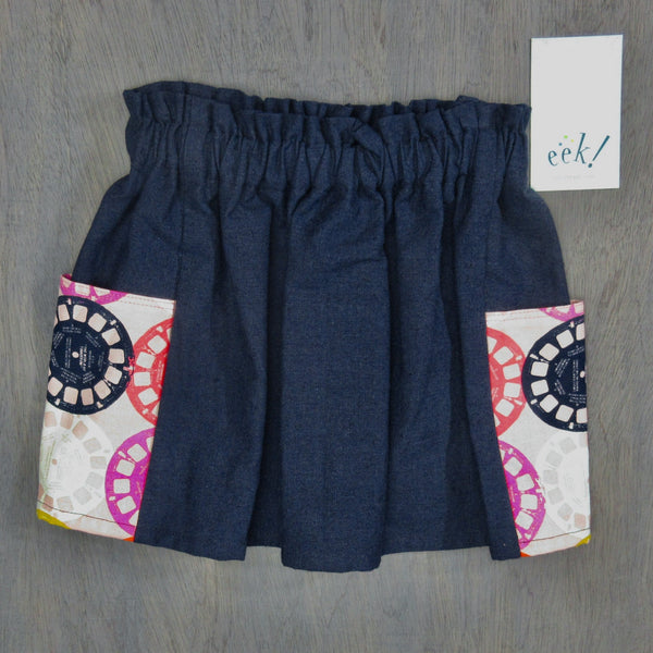 Child's vintage linen and cotton skirt, navy blue linen with a fun, nostalgic Viewfinder reels fabric in a pale lilac, size 5